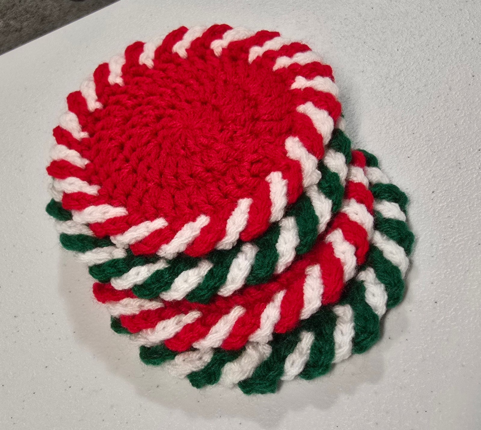 Crochet Coasters Set of 4 - Red & Green Peppermint Swirl Design, Handmade Decor, Holiday Table Accessories