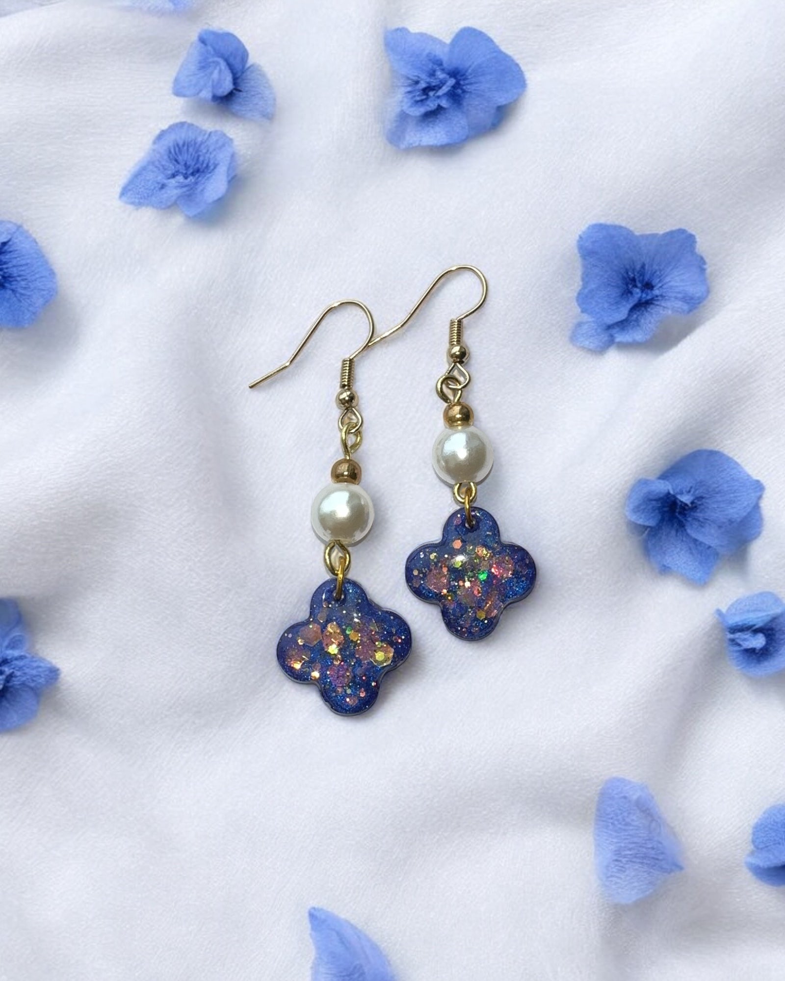 Frillmart Women's Dangle Earrings with Glittery Blue Floral Design, Pearl Beads, and Gold Accents